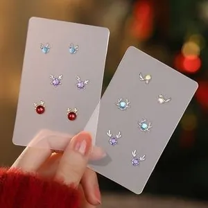 Detailed close-up of S925 silver reindeer earring set with colorful crystal inlays