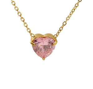 Macro shot of gold-plated necklace featuring a pink heart-shaped zircon and O-chain link