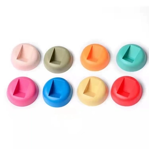 Colorful circular phone stand bases in 8 bright colors for desktop and tablet support