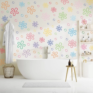 Vibrant cartoon flower and bubble wall decals in a modern bathroom setting