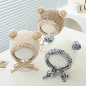 Winter plush baby earflap hat with double pom ears and straps for toddlers