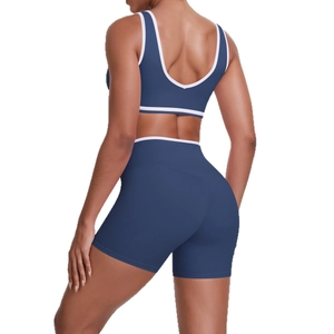 Ensemble de yoga bleu marine pour femme avec short taille haute et brassière à liseré blanc