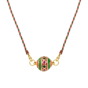 Detailed macro view of colorful enamel ball pendant with tri-color braided rope necklace