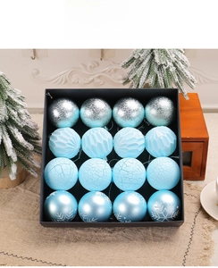 Detailed view of 16-piece blue and silver Christmas ball set with snowflake patterns