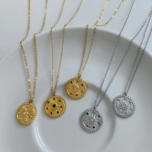 Vintage sun medallion necklace set with colorful crystals in gold and silver finish
