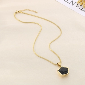 Elegant gold snake chain necklace with black five-leaf clover flower pendant for women