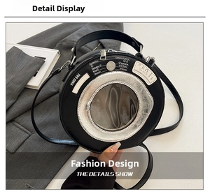 Close-up of creative washing machine shape round bag with transparent window and dial