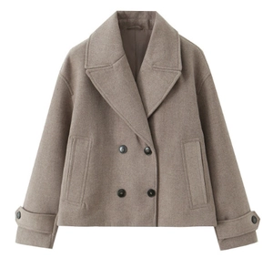 Detail of taupe double-breasted short coat with wide lapels and wool texture