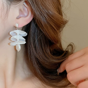 Elegant white lace floral earrings with baroque pearls and tiered organza petals