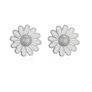 Detailed view of white daisy stud earrings with silver metal and enamel petals