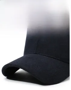 Detailed close-up of dark blue baseball cap showing the sturdy brim and premium wool texture