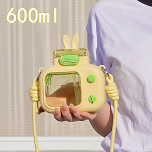 Creative TV-shaped yellow water bottle with bunny ears and 600ml scale details