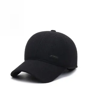 Detail of wool baseball cap with ear flaps and SPORT embroidery for winter warmth