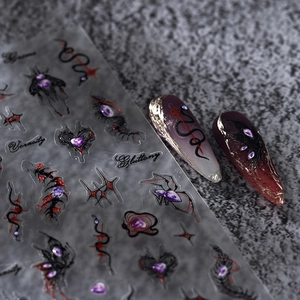 Dark gothic embossed nail stickers with 3D spider, eyeball, and heart patterns