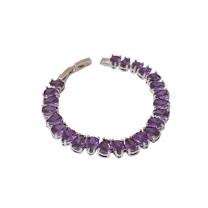 Luxury silver bracelet featuring teardrop purple zircon stones with a secure snap clasp