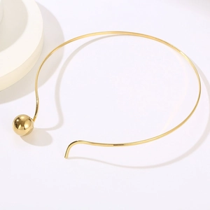 Minimalist gold titanium steel choker necklace featuring a sleek metal ball pendant design