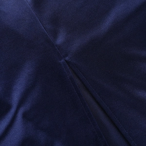 Macro shot of high-quality stitching and slit detail on royal blue satin evening dress