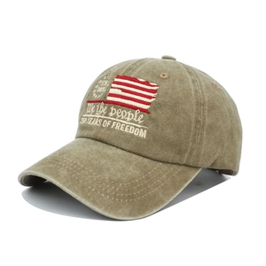 Detailed embroidery on vintage baseball cap featuring US flag and patriotic text