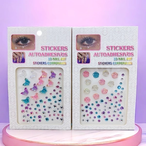 Close-up of 3D self-adhesive nail and body stickers with butterfly and rose designs