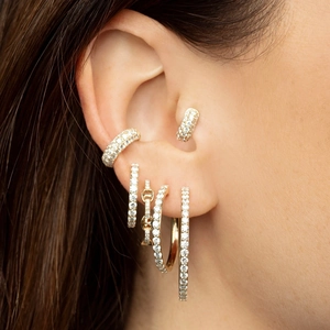 Detail of 18K gold hoop earrings with micro-p鑲 inlay cubic zirconia on earlobe