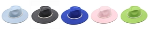 Flat lay of five colorful wool jazz hats with pearl bands on a white background