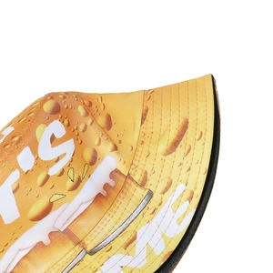 Close-up of beer and ice cube print on yellow gradient sun hat with twill texture
