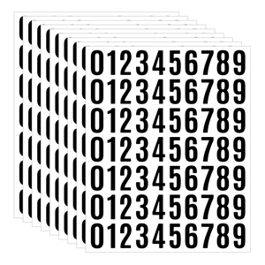 Macro detail of waterproof vinyl number stickers 0-9 in black and white layered layout