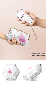 Detailed close-up of floral sun umbrella and matching clasp bag with bird pattern print