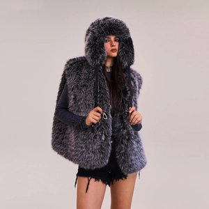 Detail of dark grey faux fur hooded vest showing plush texture and winter styling