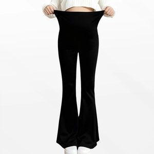Close-up of high-waisted maternity flare leggings showing excellent fabric stretch and elasticity