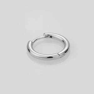 Detailed view of polished S925 sterling silver hoop earrings on a light gray surface