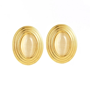 Vintage gold oval earrings with cream natural stone inlay on a clean white background