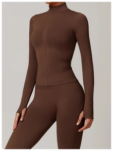 Detailed close-up of seamless yoga jacket with zipper stand collar and thumb holes