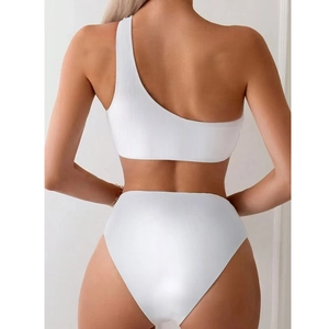White one-shoulder ribbed bikini set with high-waist bottoms and open back view