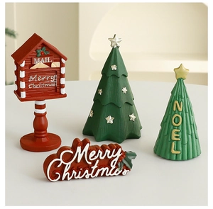Set of Christmas resin ornaments featuring red mailbox, mini trees and festive signs