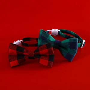 Set of two plaid pet collars with bells and buckles in red and green festive colors