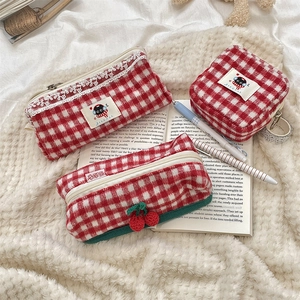 Three-piece set of red and white plaid knit pouches for pens and cosmetics storage