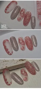 Detailed close-up of 5D embossed nail stickers featuring red lace patterns and silver glitter