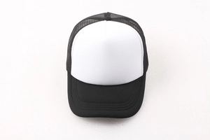 Detailed top view of a breathable mesh trucker hat with black and white contrast panels