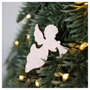 Close-up of a pink glitter angel ornament hanging on a Christmas tree with bokeh lights