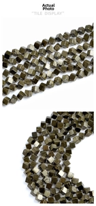 Macro shot of cubic natural pyrite stones with metallic luster for jewelry making