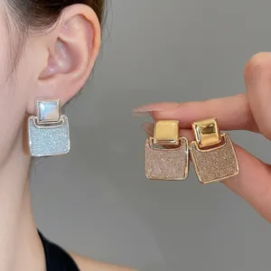 Elegant 18k gold plated square shimmering stud earrings for women in gold and silver