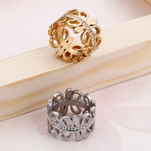 Titanium steel hollow wide ring with crystals in gold and silver finish for women