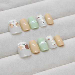Handmade cat and fish bone cartoon press-on nails in cream white and mint green