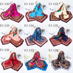 Variety of 90cm satin square scarves with colorful prints and chain patterns