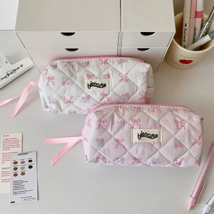 Floral quilted cotton pencil cases with pink bows and ribbon zipper for school supplies