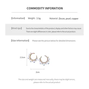 Detail view of C-shaped pearl earring with dimensions and zircon inlay specifications