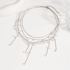 Elegant multi-layer necklace with silver chains and transparent crystal bead charms