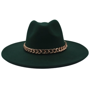 Detail of dark green wide-brim felt hat featuring a chunky gold metal chain decoration