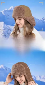 Close-up of winter trapper hat featuring quilted fabric and thick faux fur lining